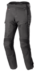 Calças Alpinestars Bogota Pro Drystar 4 Seasons, calças de motociclismo touring pretas, corte regular, áreas reforçadas nos joelhos com proteção canelada, alças de ajuste na cintura com fivelas, tecnologia impermeável Drystar, vários bolsos e fechos de ventilação