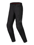 Alpinestars Stella ST-1 Waterproof Pants, Women's Adventure Touring Motorcycle Pants, Black, featuring front zippered pockets, reinforced knee panels, and reflective Alpinestars logo on the thigh, waterproof textile construction with pre-curved legs