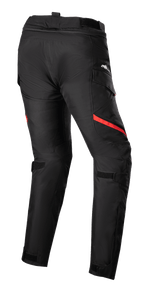 Alpinestars Stella Honda Andes V3 Drystar® Pants Femininas, calças de motociclismo touring, pretas e vermelho brilhante, vista traseira com bolsos cargo, tiras ajustáveis na cintura e nos joelhos, e construção têxtil durável para todas as condições climatéricas