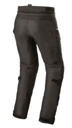 Alpinestars Calças Stella Andes V3 Drystar® para Mulher, calças de motociclismo para adventure touring, pretas, vista traseira com bolsos cargo e tiras de ajuste nas pernas, construção têxtil durável com tecnologia Drystar® impermeável