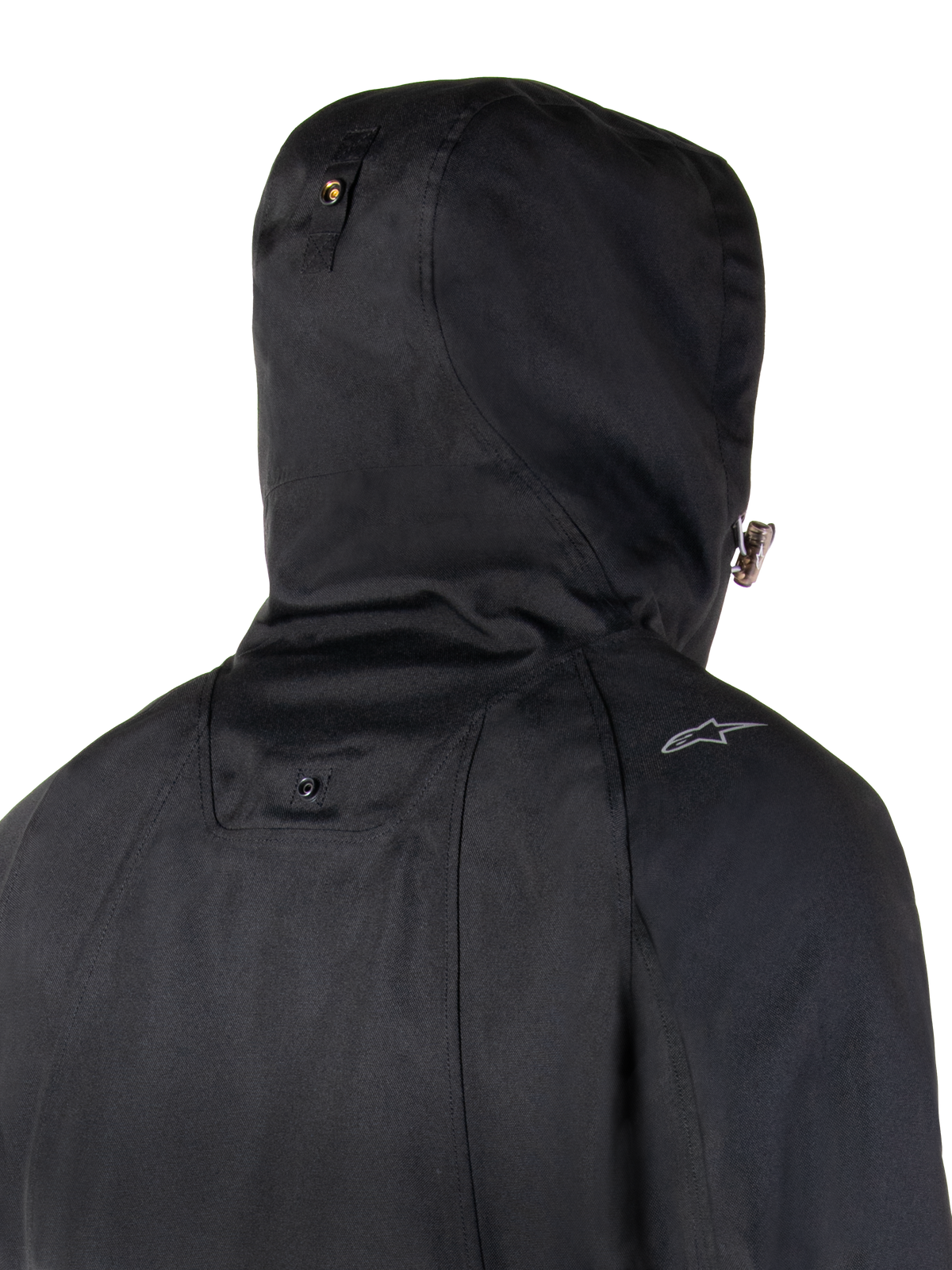 Alpinestars Morush Waterproof Parka, Black, close-up back view of the hood and shoulder area, featuring a stormproof hood system with snap button and a small Alpinestars logo, urban motorcycle streetwear style