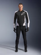 Alpinestars Viper Air V4 Jacket, Black and White motorcycle jacket with large white logo on chest, worn by a male model with black pants and gloves, featuring mesh panels for ventilation, sporty road riding apparel