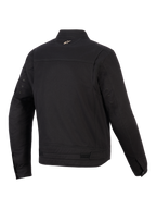 Alpinestars Bruiser Jacket, casaco de motociclismo urbano, preto, vista traseira mostrando painéis de ombro articulados, ajustadores de cintura e pequeno logótipo bordado na gola, design têxtil robusto inspirado em vestuário de trabalho