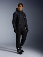 Alpinestars Mogress Air Jacket, Urban Motorcycle Jacket, Black with Lime Punch and White accents, worn with black riding pants, gloves, and black and white boots, contemporary utility-inspired design.