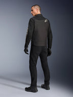 Alpinestars T-Dyno Air Jacket, Black, Back view of model wearing a breathable textile motorcycle jacket, featuring white Alpinestars logo on the shoulder, paired with black pants and gloves, urban riding style
