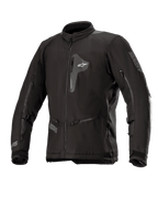 Alpinestars Venture XT Jacket, Black textile motorcycle jacket, front view showing zippered chest pocket and large sleeve vents, adjustable straps on arms, high collar, water-resistant construction for adventure touring.