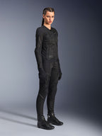 Female rider wearing the Alpinestars Stella Troop-Air Jacket in Black, featuring technical 2D mesh construction, paired with matching black motorcycle pants, gloves, and boots, styled for urban riding.