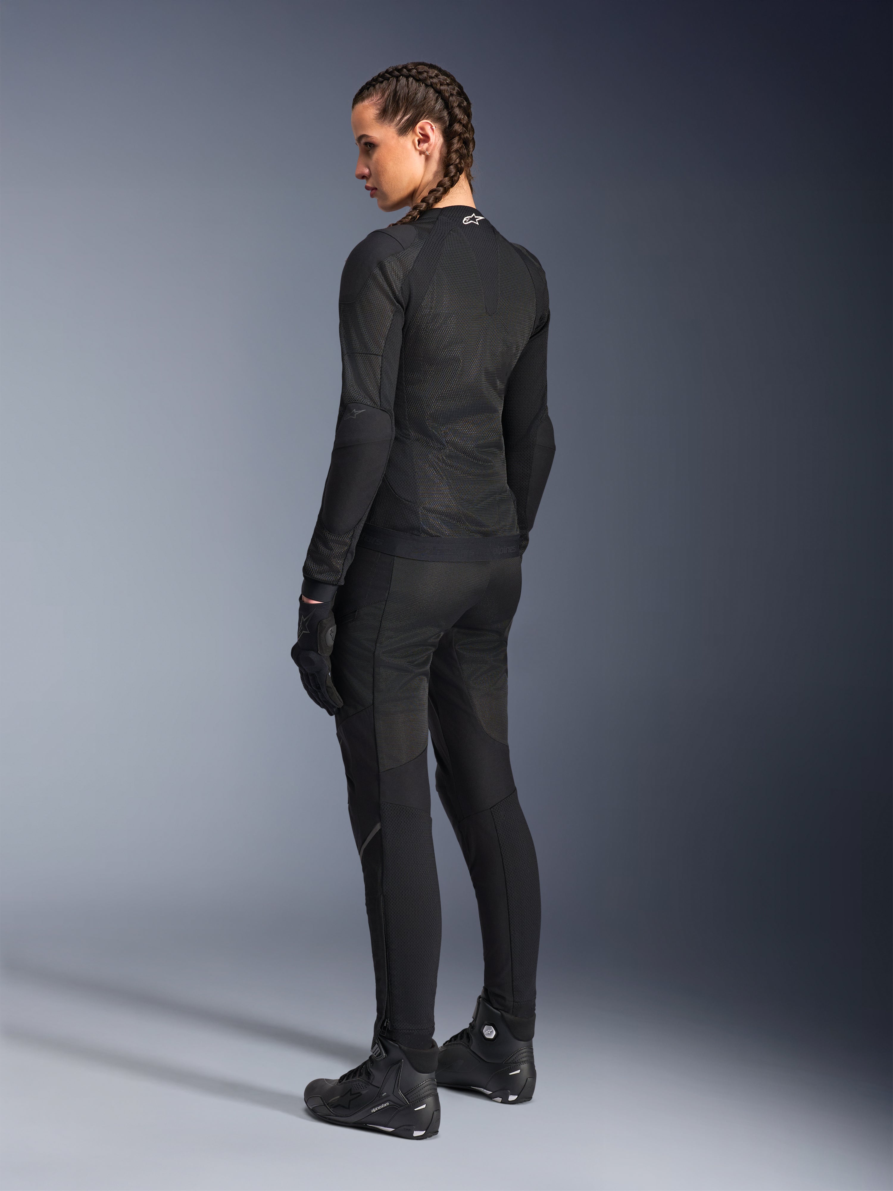 Alpinestars Woman Stella Troop-Air Jacket, Black, back view, worn with matching black motorcycle pants, gloves, and boots, slim-fit technical mesh construction for urban riding
