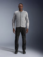 Casaco Alpinestars C-1 Air em prateado, casaco têxtil de motociclismo urbano para homem com painéis de malha ventilada, usado por um modelo com calças de condução pretas e botas pretas, estilo urbano contemporâneo