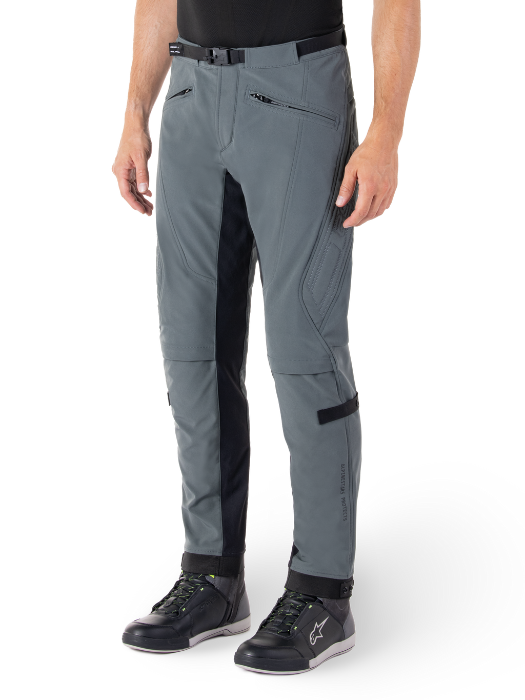 Alpinestars Alden Pants, Urban Gray and Black motorcycle pants, streetwear-inspired textile riding pants with 3-layer stretch softshell, black inner leg panels, built-in waist belt, slim fit below the knee, worn with black riding shoes
