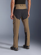 Alpinestars Flex-AST Explorer Pants, Walnut Black adventure motorcycle pants, rear view showing black ripstop panels on the seat and legs, elasticated waistband and durable stretch textile construction.