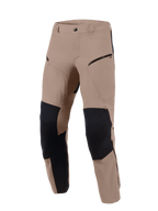 Alpinestars Flex-AST Explorer Pants, Walnut Black, adventure motorcycle pants featuring walnut brown stretch textile with black ripstop reinforcement panels on the knees and inner legs, zippered cargo pockets, and a durable design for diverse terrains.