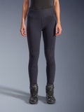 Alpinestars Stella Flex-Ast Leggings, leggings de motociclismo para mulher, pretas, corte de cintura alta com painéis articulados nos joelhos e costuras contornadas, usadas por modelo com botas de condução pretas, vestuário de condução de performance urbana