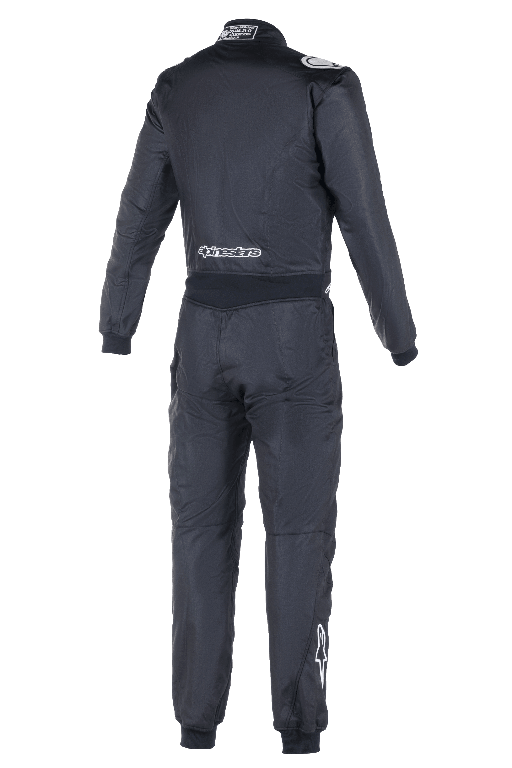 Macacão Alpinestars Atom FIA, fato de automobilismo, vista traseira em preto, com logótipo Alpinestars a branco na zona lombar e na barriga da perna direita, etiqueta de homologação FIA na gola, construção têxtil de peça única para segurança profissional em desportos motorizados