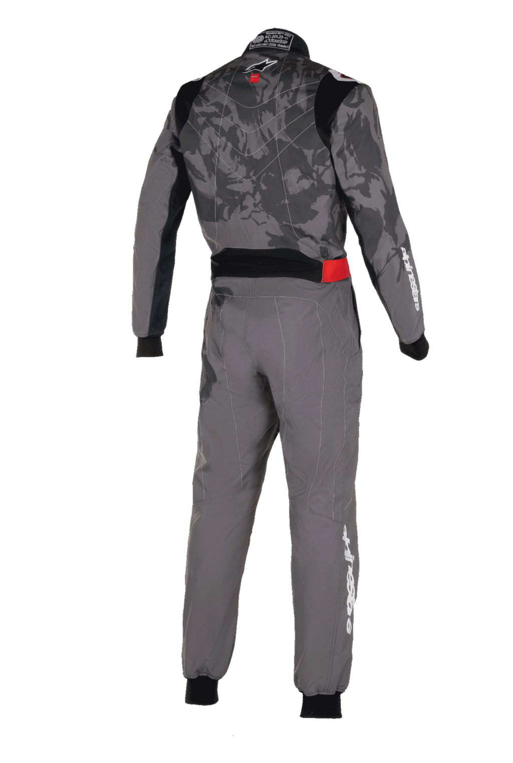 Macacão Alpinestars KMX-9 V3 Graphic 5, macacão de karting, cinzento escuro e preto, vista traseira com um padrão gráfico de camuflagem no tronco, pormenor vermelho na cintura e logótipo Alpinestars branco na manga e na perna