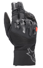 Alpinestars Bogota Drystar XF Gloves, full-length motorcycle touring gloves, black with a red logo accent, featuring over-injected knuckle protection, ribbed stretch wrist panels, and a long cuff with a grey star logo.