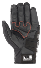 Luvas Alpinestars SMX Z Drystar®, luvas de motociclismo de punho curto, pretas com costuras contrastantes em vermelho, vista da palma mostrando a construção em pele e o acolchoamento reforçado, com o logótipo Alpinestars Protects no punho.