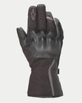 Luvas Alpinestars Stella Tourer W-7 Drystar® para Mulher, luvas de motociclismo de inverno pretas com punho longo, construção em pele e softshell, proteção rígida nos nós dos dedos coberta por pele, detalhes prateados refletores e logótipo Alpinestars no dedo.
