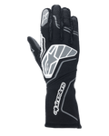 Luvas Alpinestars Tech-1 ZX V4, luvas de corrida para automobilismo, pretas e cinzento antracite, com um logótipo de estrela grande no dorso da mão e logótipo Alpinestars no punho longo, logótipo de estrela no dedo indicador, construção profissional resistente às chamas