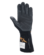 Luvas Alpinestars Tech-1 ZX V4, luvas de automobilismo, pretas e laranja fluorescente, vista da palma com padrão de aderência de silicone 3D e textura em favo de mel, etiquetas de homologação FIA e SFI visíveis no punho, equipamento profissional de desportos motorizados