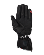 Luvas Alpinestars SP-3, luvas de motociclismo em couro preto, vista da palma com painéis de aderência reforçados, dedo indicador compatível com ecrã tátil, punho longo com logótipo branco na correia do pulso e marca 'ONE GOAL. ONE VISION.' na bainha.