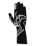 Luvas Alpinestars Tech-1 Race V4, luvas de automobilismo, Preto Tar Gray, com um logótipo de estrela geométrica branco de grandes dimensões, marca Alpinestars no punho e no dedo indicador, estilo de cano longo para desportos motorizados de alta performance