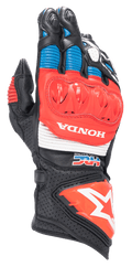 Luvas Alpinestars Honda GP Pro R3, luvas de motociclismo de cano longo para corrida, pretas com detalhes em vermelho vivo e azul, com proteção de nós dos dedos rígida DFS em vermelho, logótipos HONDA e HRC em branco, couro perfurado com painéis em acordeão e logótipo da estrela Alpinestars no punho