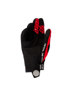 Luvas Alpinestars 2026 Pro-Dura, luvas de motocross e enduro, vermelho vivo e preto, vista da palma apresentando camurça sintética preta, texto branco 'ONE GOAL. ONE VISION' na lateral e padrões de colmeia vermelhos nas pontas dos dedos