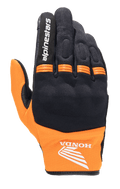 Alpinestars Honda Copper Glove, luva de motociclismo urbana leve, preto e laranja, com o logótipo da asa da Honda no pulso, texto Alpinestars no dedo indicador, construção em malha e painéis em acordeão cor de laranja nos nós dos dedos