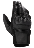 Alpinestars Stella Phenom Leather Air Glove, luvas de motociclismo para mulher, pretas, vista do dorso com destaque para a proteção rígida e perfurada nos nós dos dedos, articulações dos dedos almofadadas e textura de pele premium.