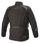 Alpinestars Ketchum GORE-TEX Jacket, jaqueta de motociclismo, preta, vista traseira com corte touring alongado, detalhes refletores nos ombros e braços, marca Alpinestars na parte superior das costas e zona inferior da cintura