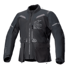 Alpinestars ST-7 2L GORE-TEX Jacket, casaco de motociclismo em preto e cinzento escuro, vista frontal com bolsos de carga grandes, detalhes refletivos nos ombros e logótipo Alpinestars Exploration Equipment no peito, equipamento de aventura e touring impermeável