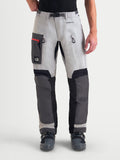 Alpinestars Arenis Gore-Tex Pants, men's adventure touring motorcycle pants in mid gray, deep gray, and black, front view on a model wearing waterproof textile gear with thigh pockets and ventilation zippers.