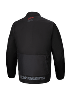 Alpinestars Pro-Dura Jacket, back view, black textile enduro jacket, large rear cargo pocket, red star logo on the neck, gray Alpinestars branding on the lower hem, rugged off-road design
