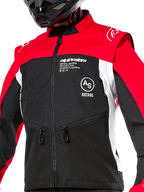 Alpinestars Pro-Dura Jacket, Off-Road Motorcycle Jacket, Black Bright Red and White, worn with a black helmet, featuring zippered pockets and bold branding on the chest, durable textile construction for enduro and trail riding