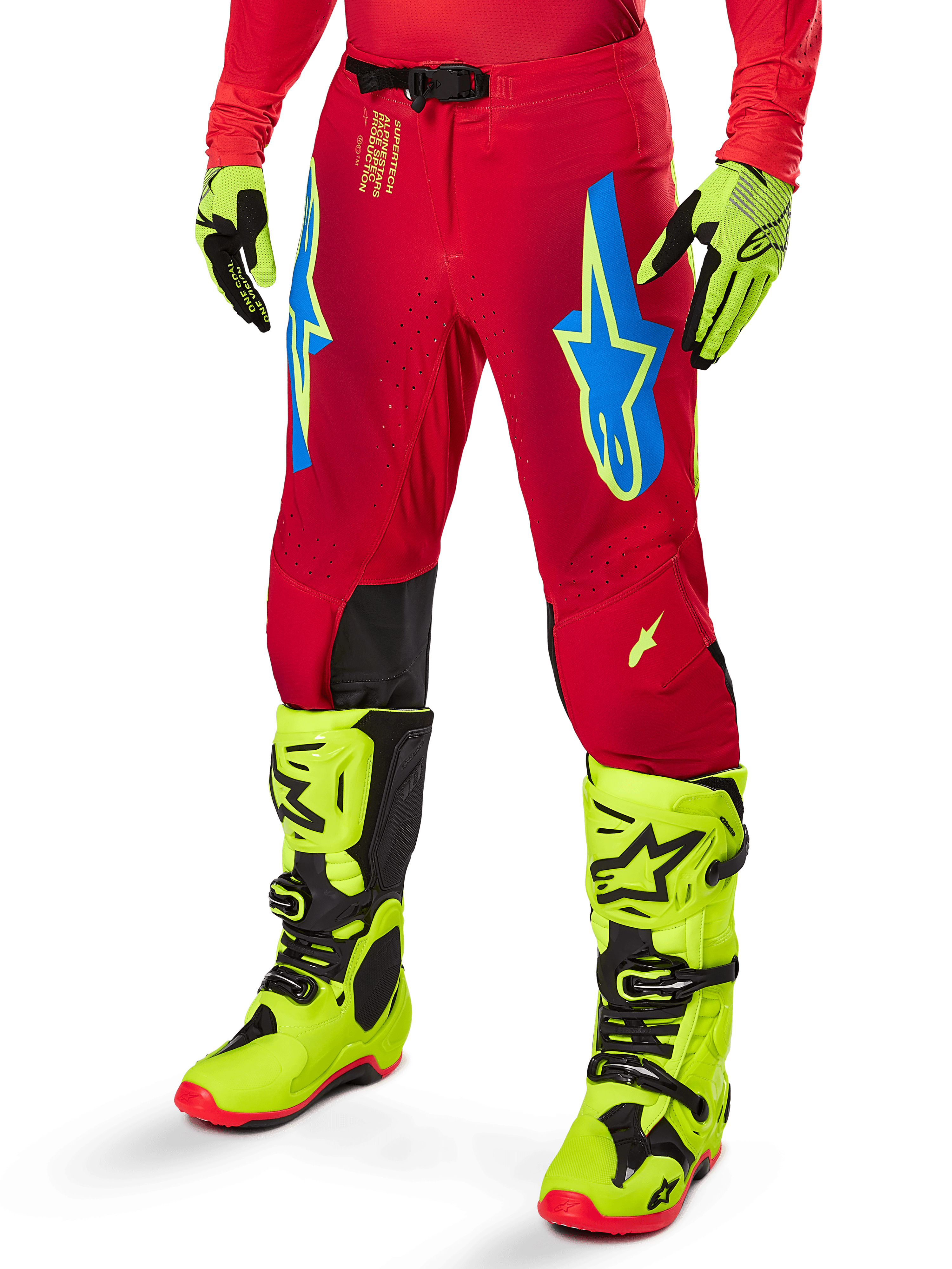 Alpinestars 2025 Supertech Maker Pants, Motocross Racing Pants, Bright Red with blue and yellow star logos, black knee panels, perforated ventilation, coordinated with neon yellow boots and gloves