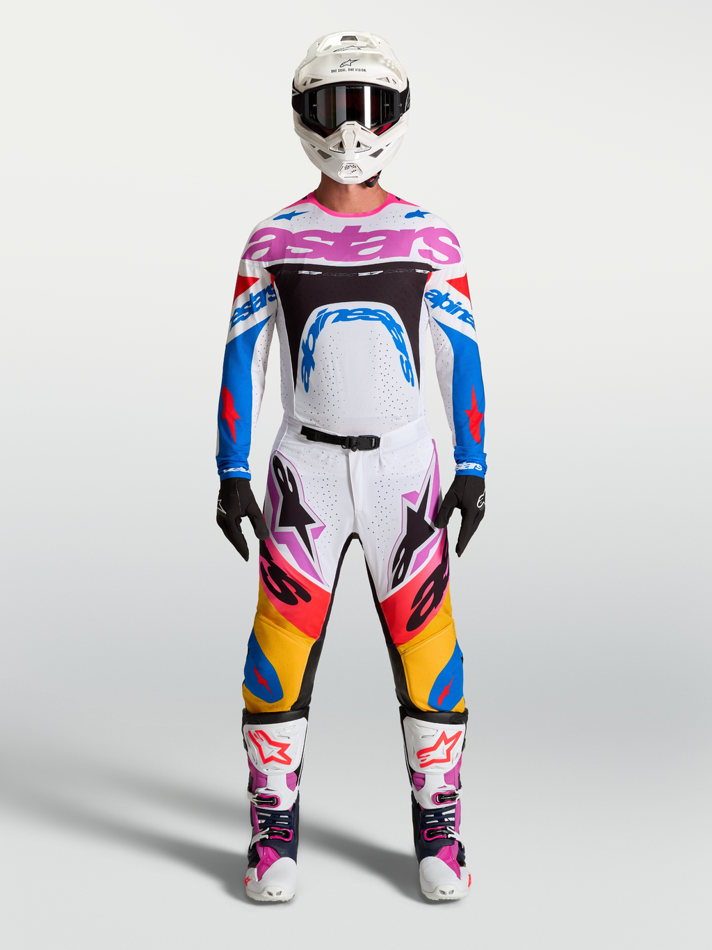 Alpinestars Supertech Dyna, fato de motocross para homem, branco e azul com pormenores rosa, conjunto de calças e camisola de alto desempenho.