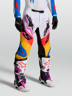 Alpinestars Supertech Dyna, calças de motocross premium, brancas e azuis, tecido rip-stop elástico com painéis em couro de cabra no joelho, ajuste atlético de nível profissional