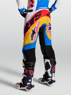 Alpinestars Calças Supertech Dyna, calças de motocross para corrida, azuis e brancas, ajuste atlético, painéis ventilados e detalhes em rosa e amarelo