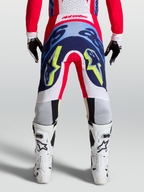 Alpinestars Calças Supertech Dyna, calças de motocross para homem, vista traseira, vermelho e azul, design racing durável e técnico