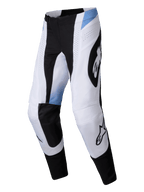 Alpinestars 2025 Techstar Melt Pants, calças de motocross, brancas e pretas com detalhes em azul claro, grandes logótipos Alpinestars pretos, furos de ventilação cortados a laser, ajuste atlético durável para corridas todo-o-terreno