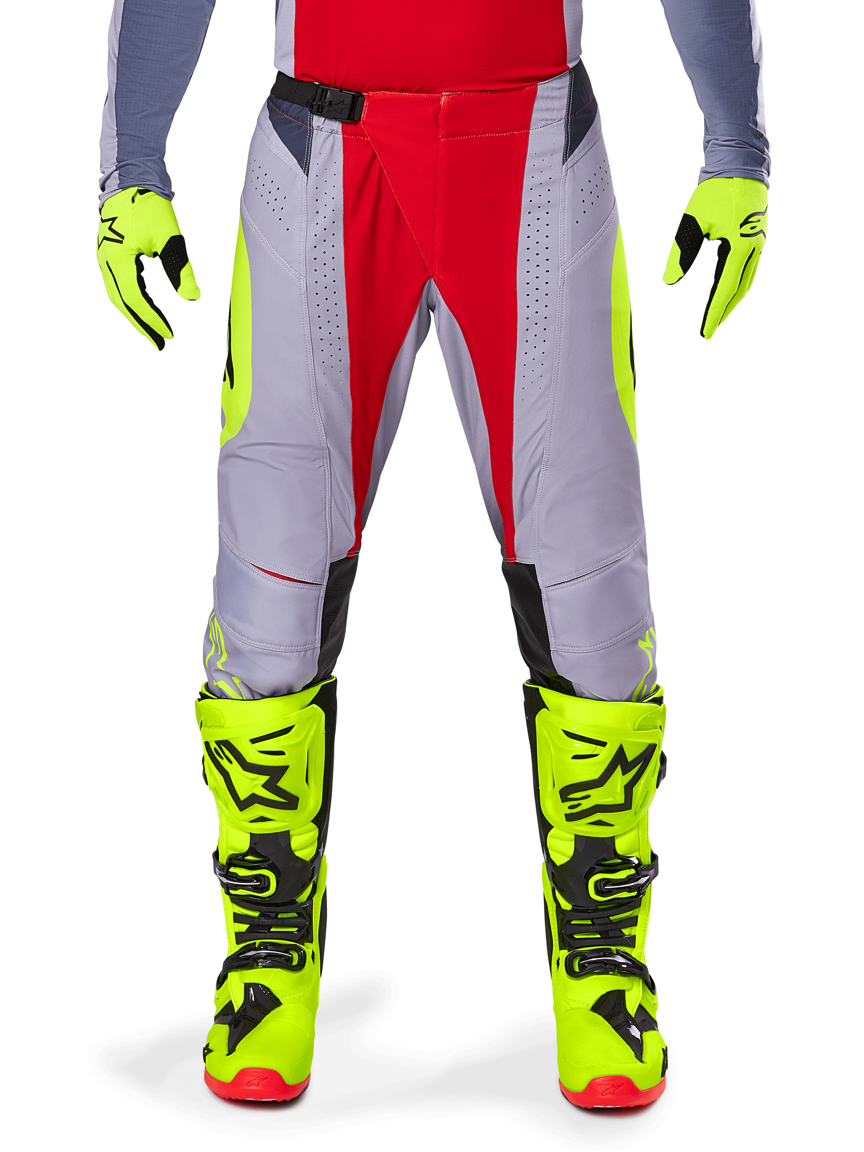 Alpinestars 2025 Techstar Melt Pants, Motocross Pants, Bright Red Gray, featuring a gray chassis with red central panels and neon yellow side accents, laser-cut perforations for ventilation, worn with neon yellow gloves and boots, high-performance gear for off-road racing