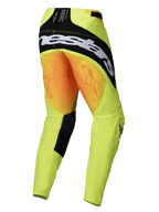 Alpinestars 2025 Techstar Melt Pants, calças de motocross, amarelas e pretas, vista traseira com um grande logótipo Alpinestars preto no assento e grafismos de estrela cor-de-laranja nas coxas, tecido técnico amarelo fluorescente com painéis pretos no interior das pernas.
