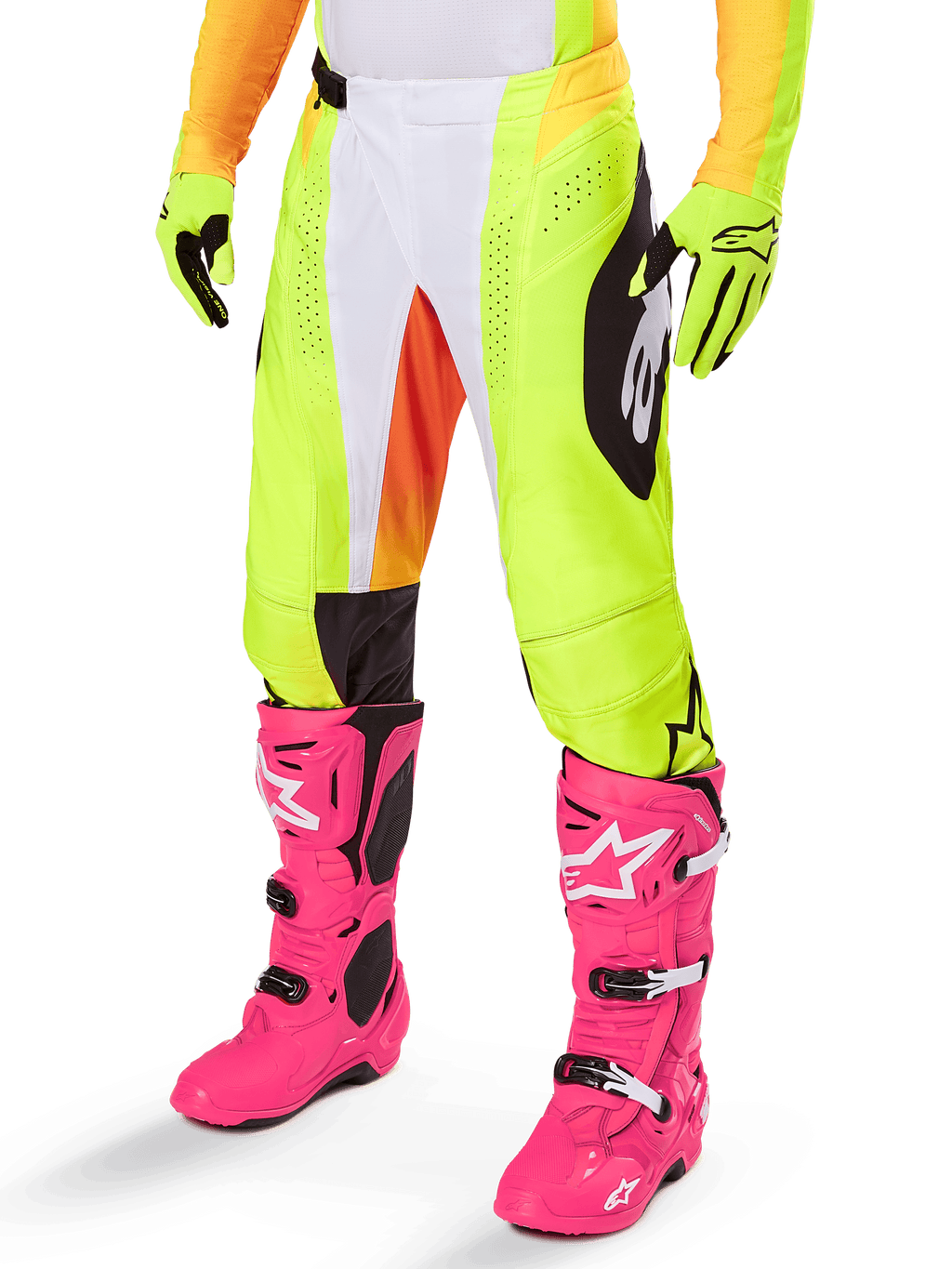Alpinestars 2025 Techstar Melt Pants, calças de motocross, amarelo néon com detalhes brancos e laranja, padrões laterais pretos, usadas com botas de motocross cor-de-rosa vibrante e luvas amarelo néon, com perfurações para ventilação, equipamento de motocross durável