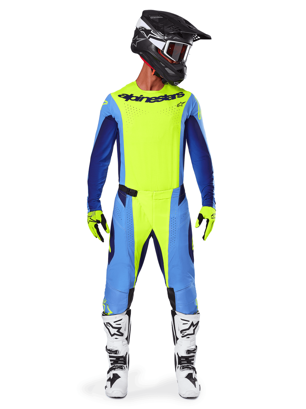 Piloto de motocross a usar o conjunto de equipamento Alpinestars 2025 Techstar Melt, camisola amarelo néon com mangas azuis e azul-marinho, calças amarelas e azuis a condizer, capacete preto e branco com óculos, botas brancas e pretas, luvas amarelas e pretas, conjunto coordenado para corridas de todo-o-terreno
