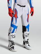 Alpinestars Calças Supertech Vesta, calças de motocross para homem, brancas e vermelhas com gráficos azuis, ajuste atlético racing em modelo