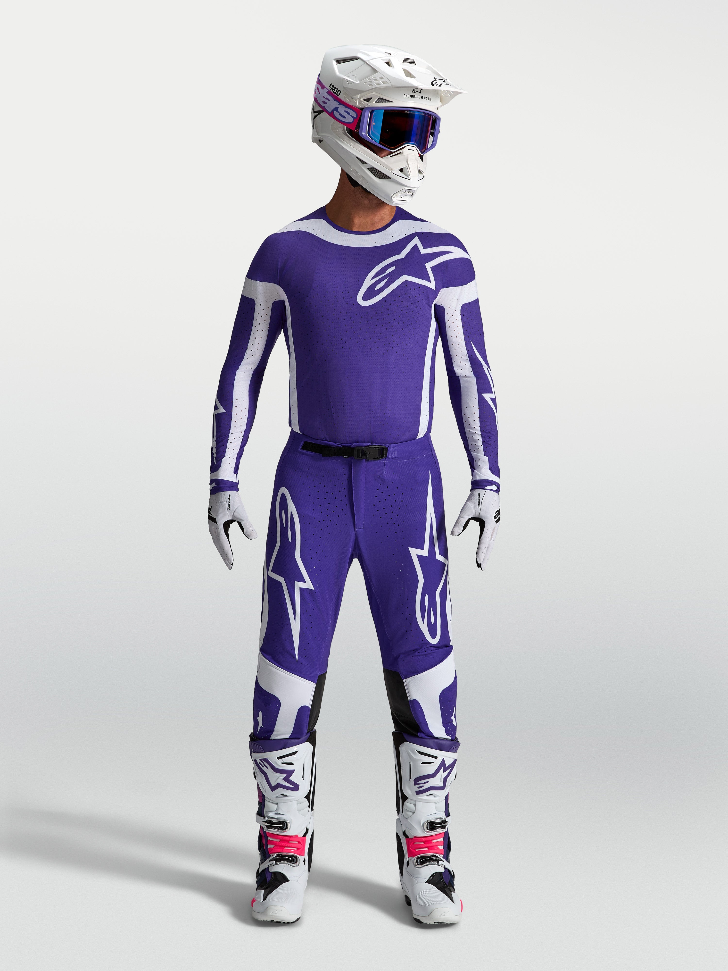 Alpinestars Supertech Vesta, calças de motocross para homem, azuis e brancas, ajuste atlético e tecido rip-stop durável.