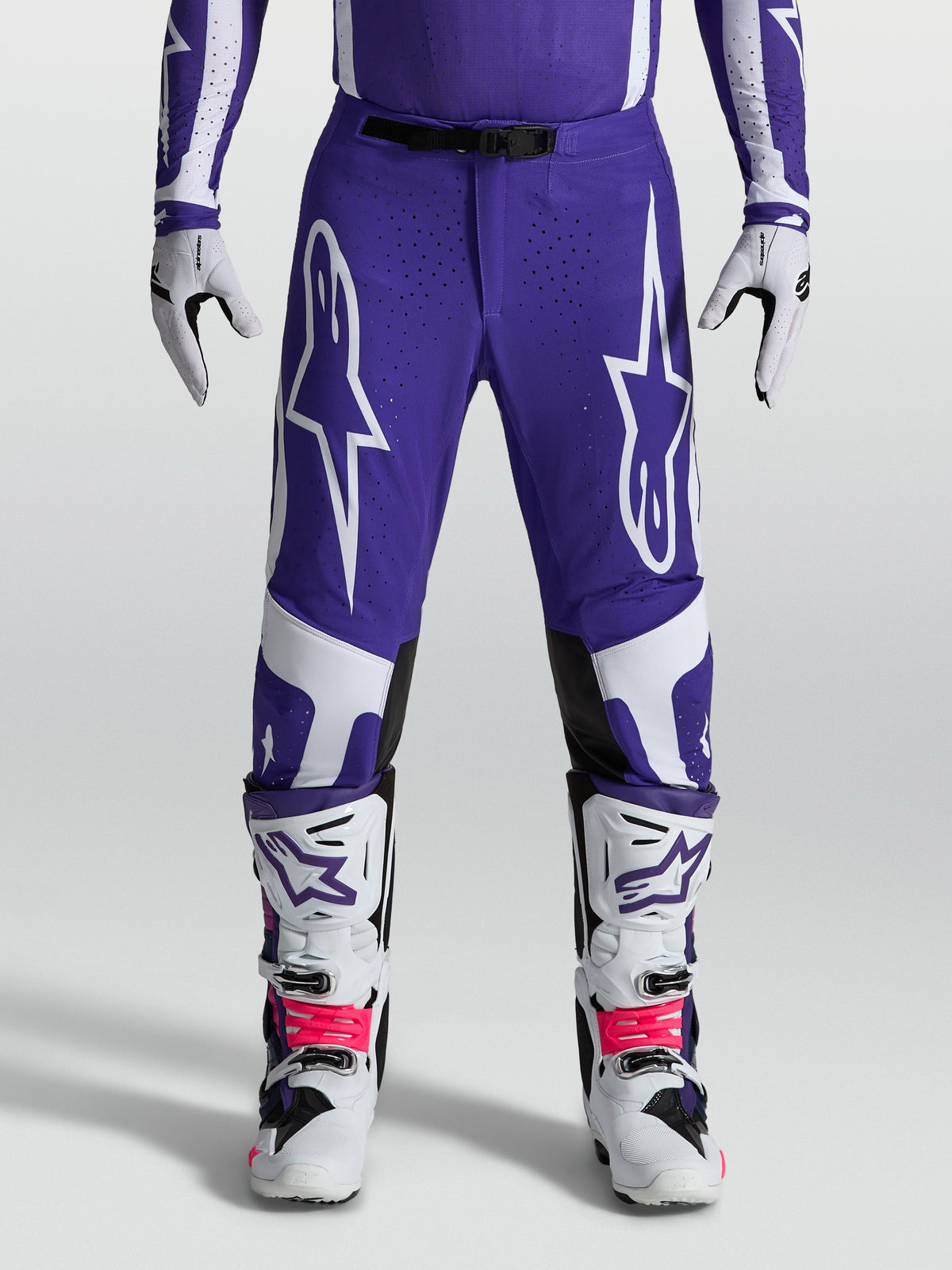 Alpinestars Calças Supertech Vesta, calças de motocross para homem, azuis e brancas, com ajuste atlético e construção rip-stop, ideais para desempenho em todo-o-terreno.