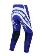 Alpinestars calças Supertech Vesta de motocross para homem, azuis e brancas, vista traseira com gráficos de estrelas e pele.