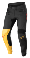 Alpinestars Supertech Blaze Pants, calças de motocross, pretas, amarelo quente e vermelho fluo, com painel de joelho amarelo distintivo, detalhes do logótipo em estrela vermelha, fecho de cintura com catraca e painéis de proteção reforçados para performance em todo-o-terreno